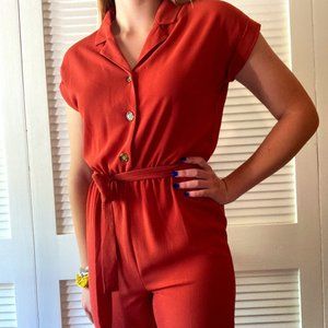 No Boundaries tri-button collared jumpsuit, rust